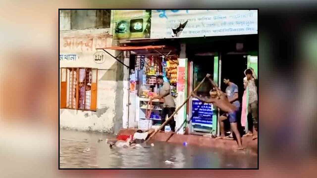 মিরপুরের শিয়ালবাড়ির পাশে হাজী রোড এলাকায় বিদ্যুৎস্পৃষ্ট হওয়া ব্যক্তিদের বাঁচানোর চেষ্টাকালে তোলা। ছবি : সংগৃহীত